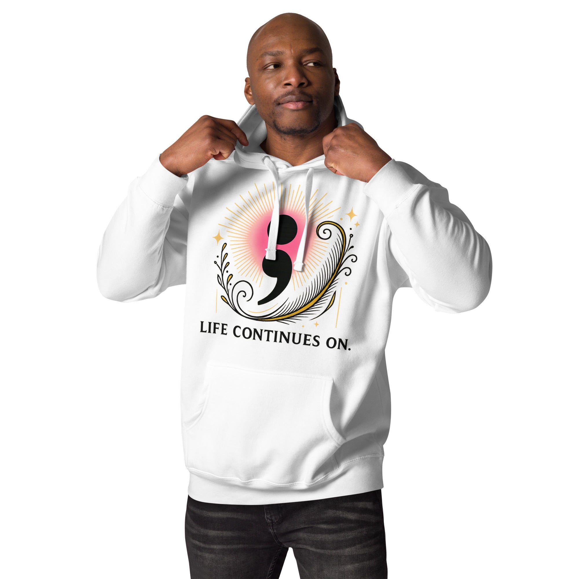 Male model wearing white hoodie with pink and gold semicolon design and the phrase “Life Continues On.”